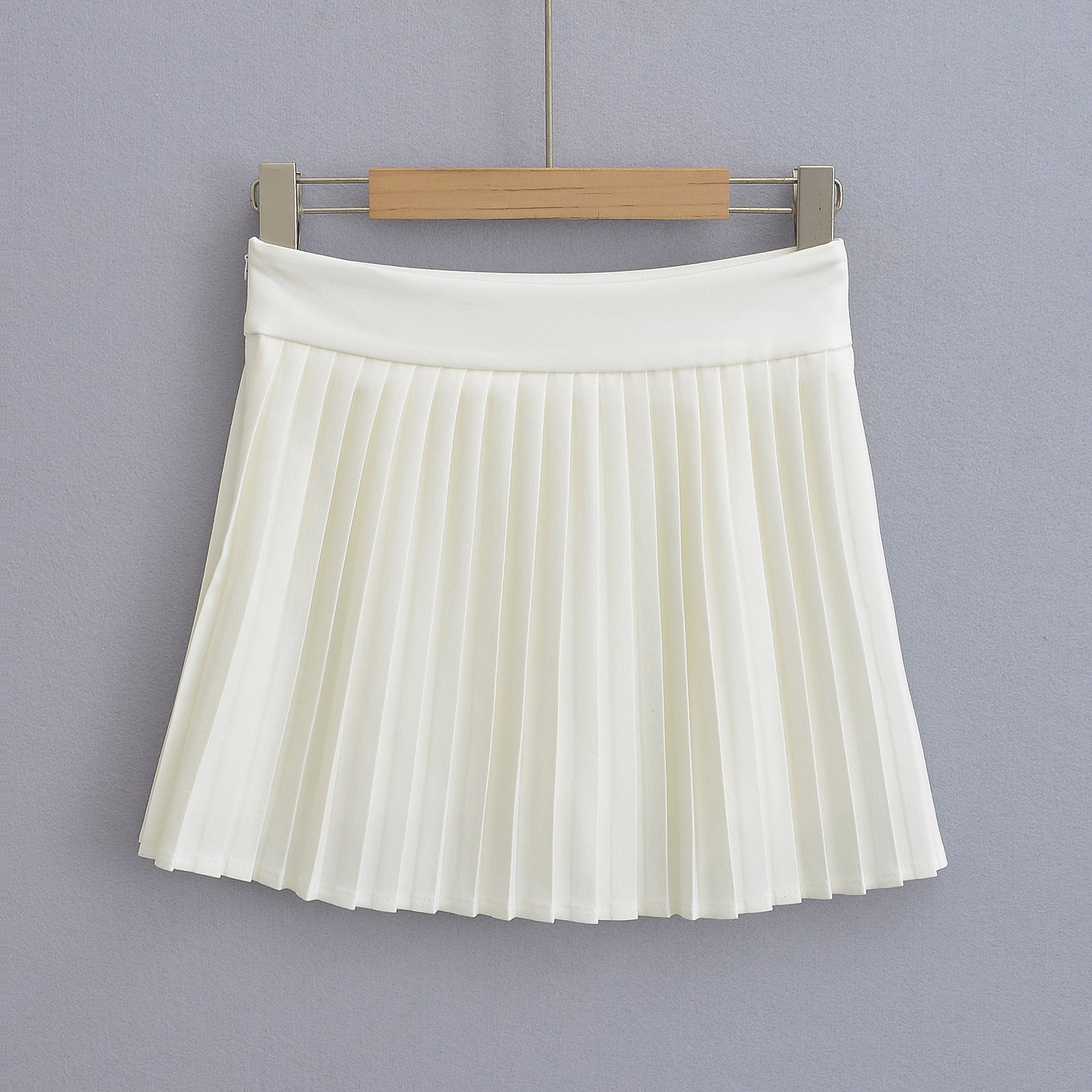 Narrow edged accordion pleated suit with pleated tennis skirt